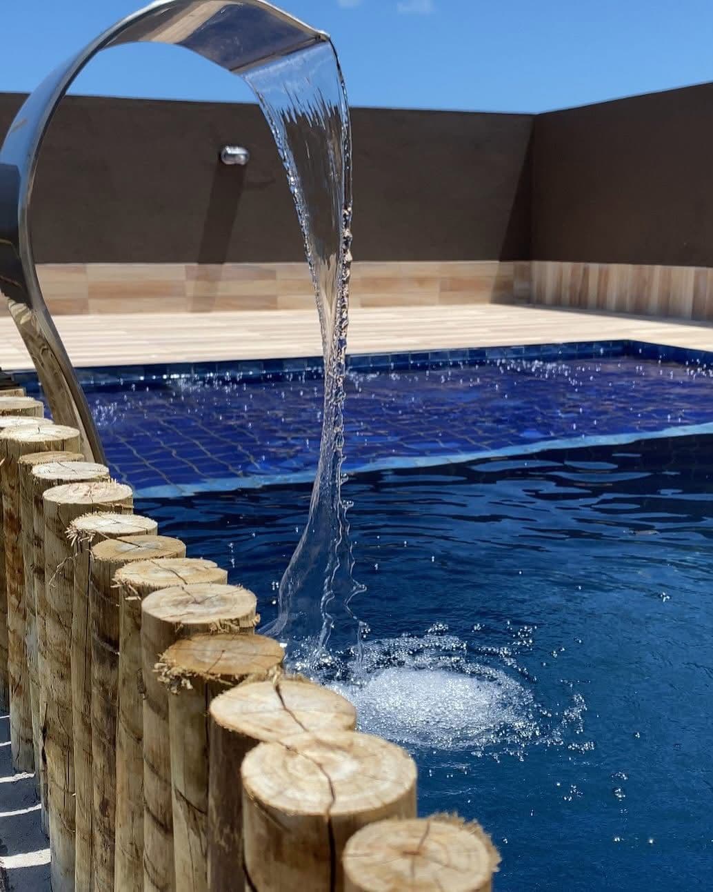 Piscina da Pousada dBoa com cascata